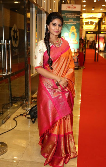 Actress Sneha In Orange Traditional Indian Pattu Saree At Santhosam Awards 9